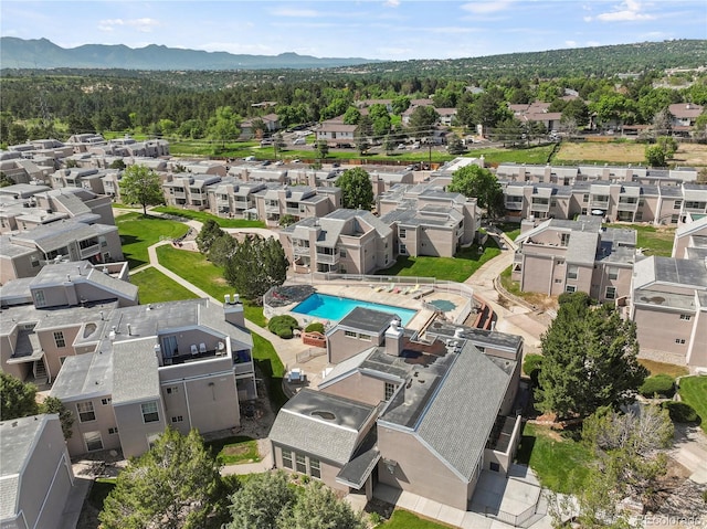 3110 Van Teylingen Dr Unit C, Colorado Springs, CO 80917 - aerial view of residential area featuring a pool area and mountains