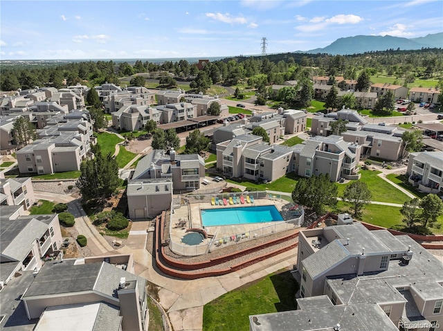 3110 Van Teylingen Dr Unit C, Colorado Springs, CO 80917 - aerial perspective of suburban area with a pool and mountains
