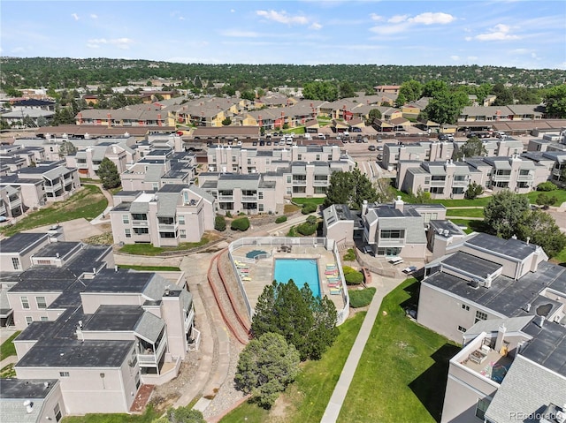 3110 Van Teylingen Dr Unit C, Colorado Springs, CO 80917 - aerial view of property and surrounding area with a pool and nearby suburban area