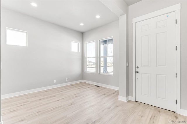 foyer entrance featuring light wood-type flooring