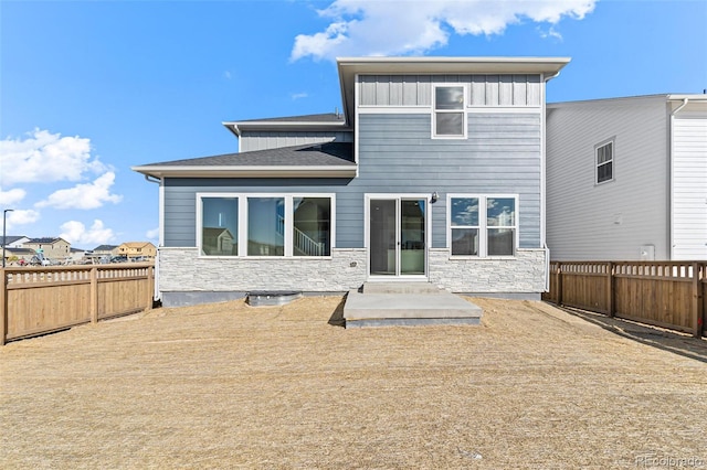 rear view of property with a patio area