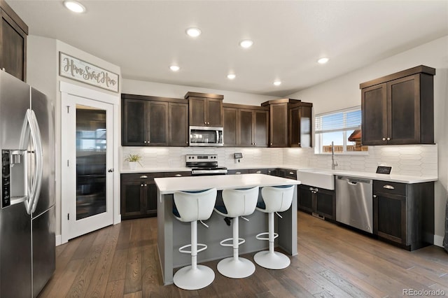 208 Dorothy Dr, Berthoud, CO 80513 - kitchen featuring a sink, dark brown cabinets, and stainless steel appliances