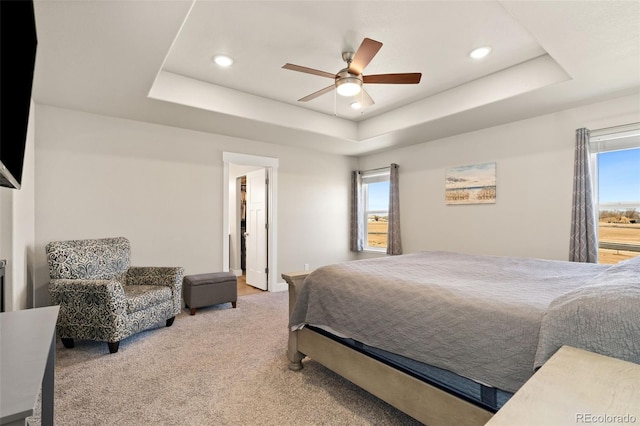 208 Dorothy Dr, Berthoud, CO 80513 - carpeted bedroom featuring a tray ceiling, ceiling fan, and recessed lighting