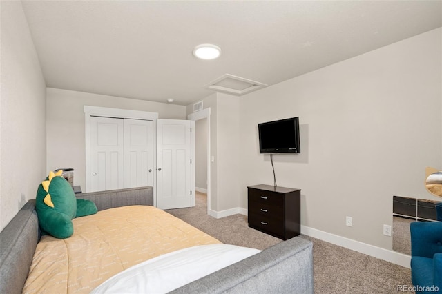 208 Dorothy Dr, Berthoud, CO 80513 - carpeted bedroom featuring a closet, visible vents, baseboards, and attic access