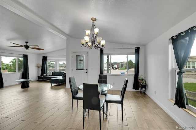 243 Cherokee Ct, Brighton, CO 80603 - dining space with vaulted ceiling, a chandelier, light wood-type flooring, a textured ceiling, and a ceiling fan