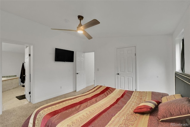 243 Cherokee Ct, Brighton, CO 80603 - bedroom featuring light colored carpet, ceiling fan, ensuite bathroom, and baseboards