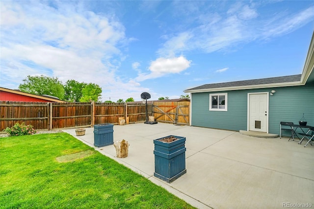 243 Cherokee Ct, Brighton, CO 80603 - view of patio / terrace featuring a gate