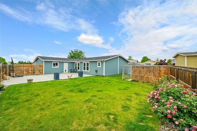 243 Cherokee Ct, Brighton, CO 80603 - rear view of house with a patio area