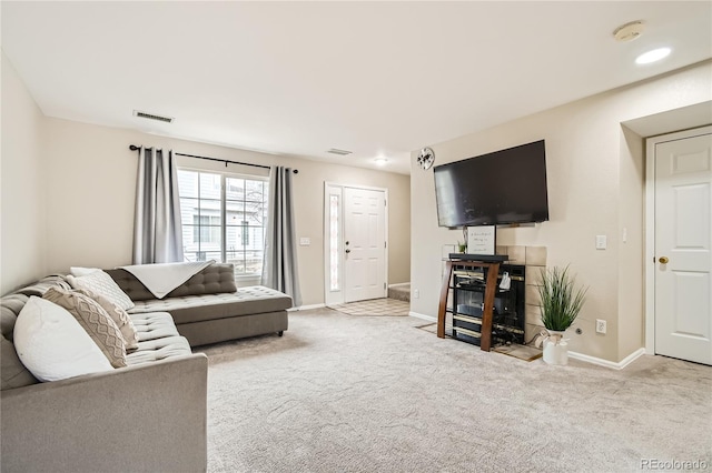 living room featuring light carpet