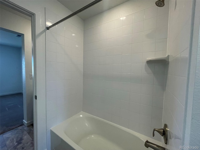 bathroom featuring  shower combination