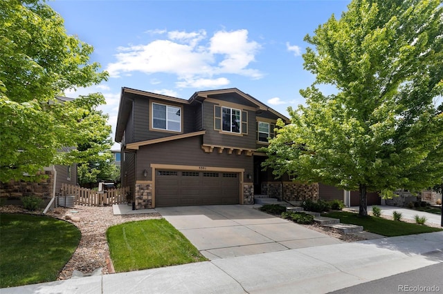 5301 Clovervale Cir, Highlands Ranch, CO 80130 - craftsman-style house featuring stone siding, concrete driveway, and a garage