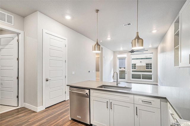 kitchen featuring white cabinetry, stainless steel dishwasher, ceiling fan, and sink