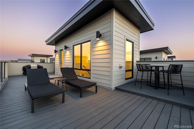 view of deck at dusk