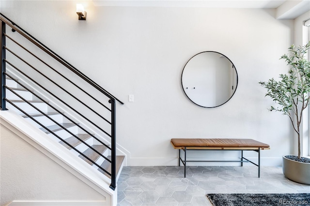 staircase with tile patterned flooring