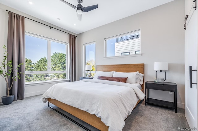 bedroom featuring ceiling fan and carpet floors