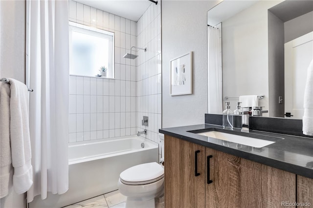 full bathroom with toilet, vanity, and shower / bath combo