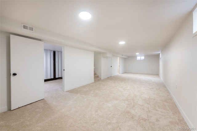 basement with light carpet