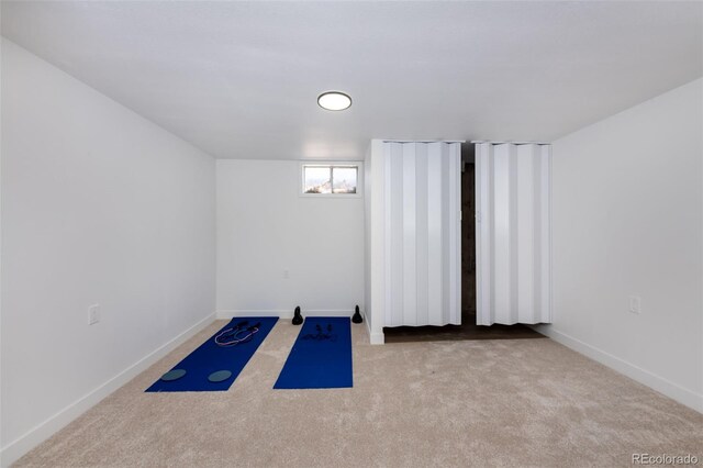 empty room with carpet flooring