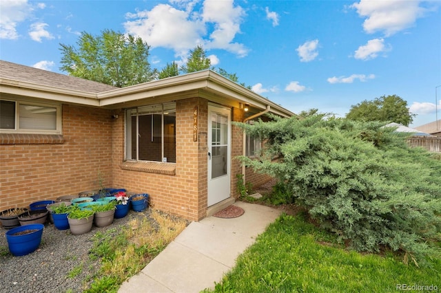 4785 Carr St, Wheat Ridge, CO 80033 - view of side of property with brick siding
