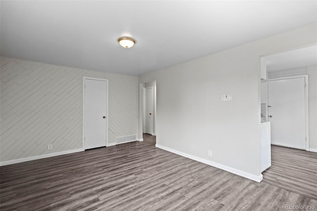 4785 Carr St, Wheat Ridge, CO 80033 - empty room with wood finished floors and baseboards