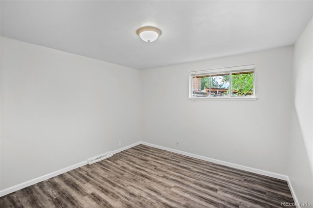 4785 Carr St, Wheat Ridge, CO 80033 - unfurnished room featuring wood finished floors and baseboards