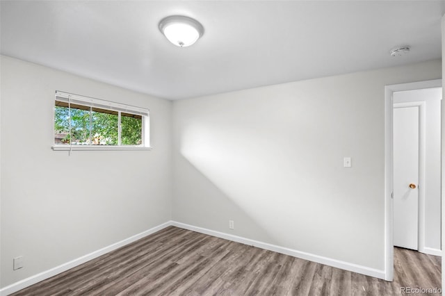 4785 Carr St, Wheat Ridge, CO 80033 - empty room featuring wood finished floors and a smoke detector