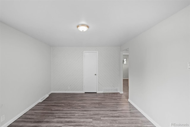 4785 Carr St, Wheat Ridge, CO 80033 - empty room featuring baseboards and wood finished floors