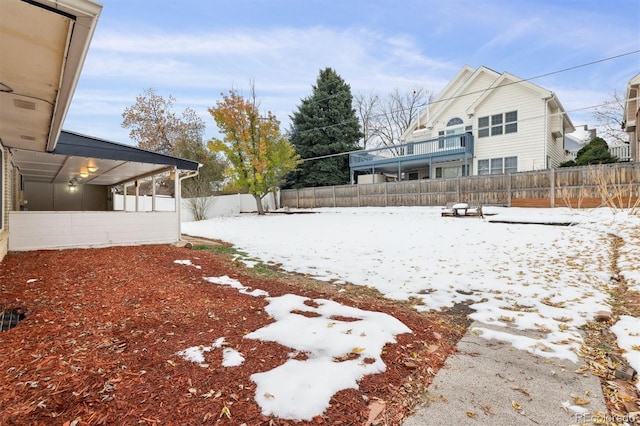 view of yard covered in snow