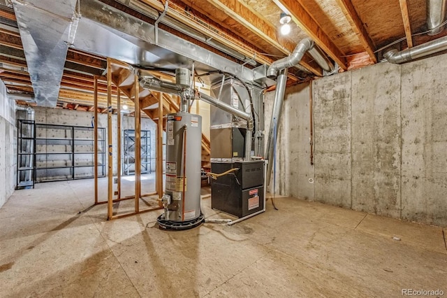 basement with water heater and heating unit