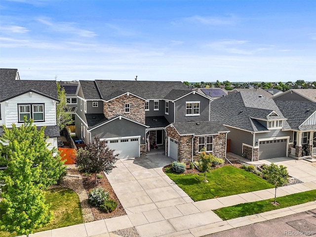 15033 Delhi Ave, Parker, CO 80134 - view of front of home with stone siding, a garage, a residential view, and driveway