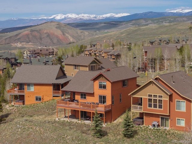 327 Summit Lift Ct, Granby, CO 80446 - aerial perspective of suburban area featuring a mountainous background