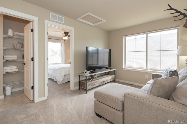 327 Summit Lift Ct, Granby, CO 80446 - living room with attic access, baseboards, and healthy amount of natural light