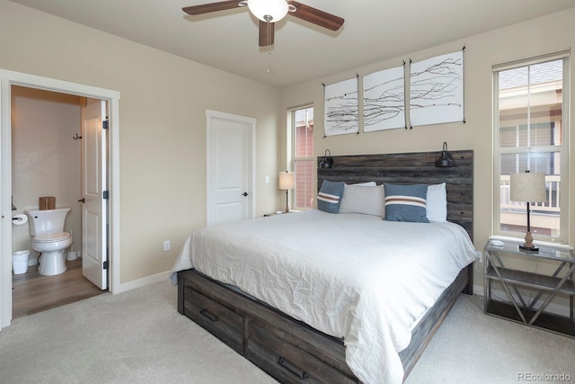 327 Summit Lift Ct, Granby, CO 80446 - carpeted bedroom featuring baseboards and connected bathroom