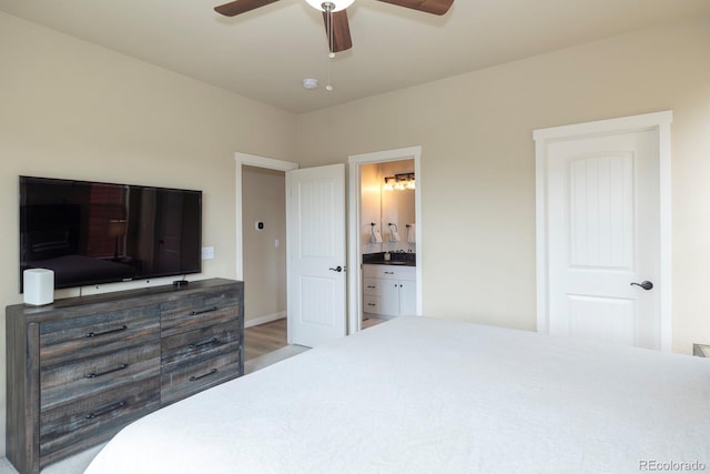327 Summit Lift Ct, Granby, CO 80446 - bedroom with wood finished floors, ensuite bathroom, and ceiling fan