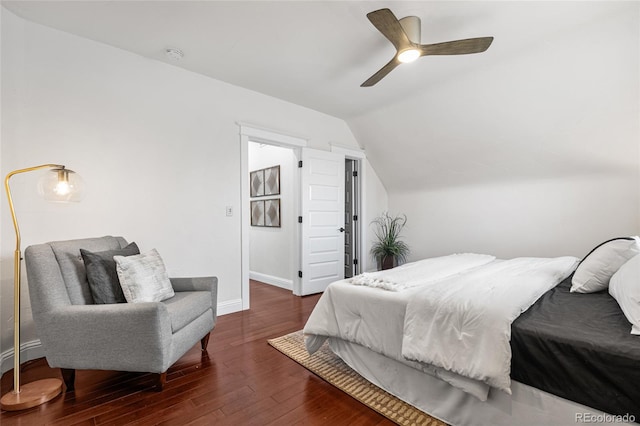 bedroom with wood-type flooring, lofted ceiling, baseboards, and ceiling fan