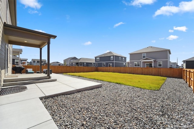 2128 Dexter St, Mead, CO 80542 - fenced backyard with a residential view and a patio area