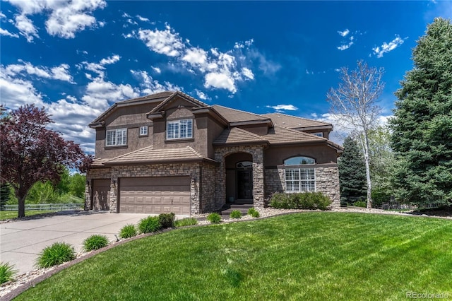 9315 E Aspen Hill Ln, Lone Tree, CO 80124 - view of front facade featuring stone siding, stucco siding, a garage, and concrete driveway