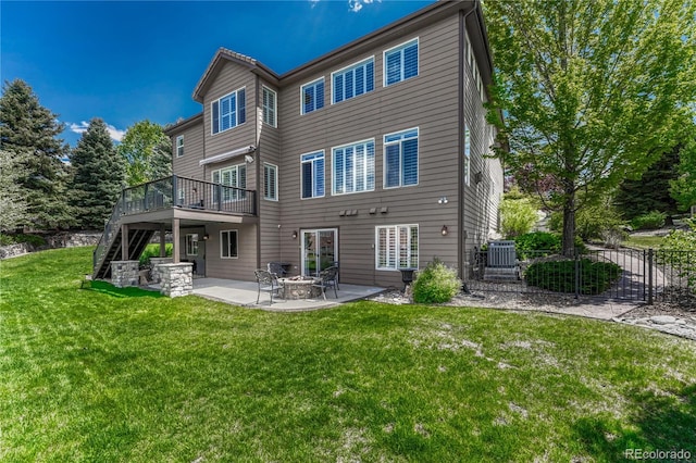 9315 E Aspen Hill Ln, Lone Tree, CO 80124 - back of house featuring stairway, a wooden deck, and a patio