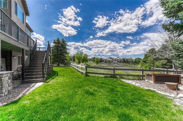 9315 E Aspen Hill Ln, Lone Tree, CO 80124 - view of yard featuring stairway and a wooden deck