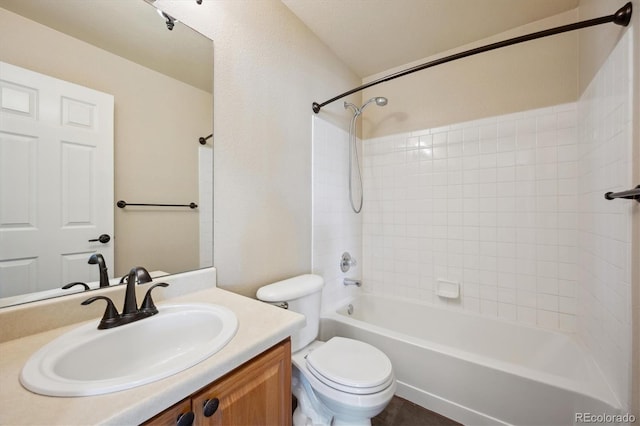 full bathroom featuring shower / bathtub combination, vanity, and toilet