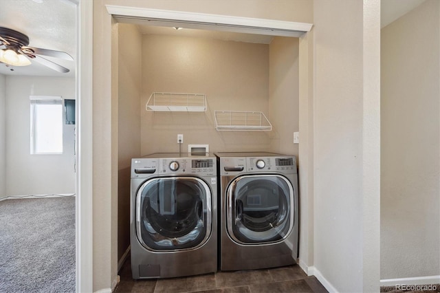 washroom with ceiling fan, baseboards, washer and clothes dryer, and dark colored carpet