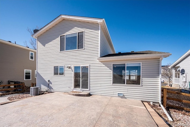 rear view of property featuring cooling unit and a patio