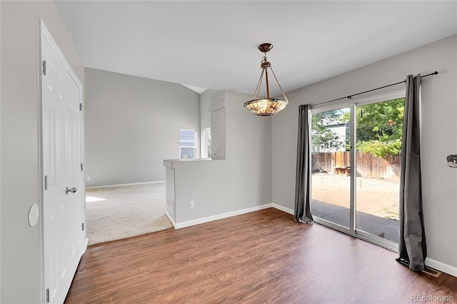 19873 E Vassar Ave, Aurora, CO 80013 - unfurnished room featuring wood finished floors and baseboards