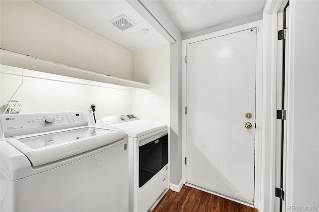 19873 E Vassar Ave, Aurora, CO 80013 - laundry room featuring washer and dryer and dark wood-style floors