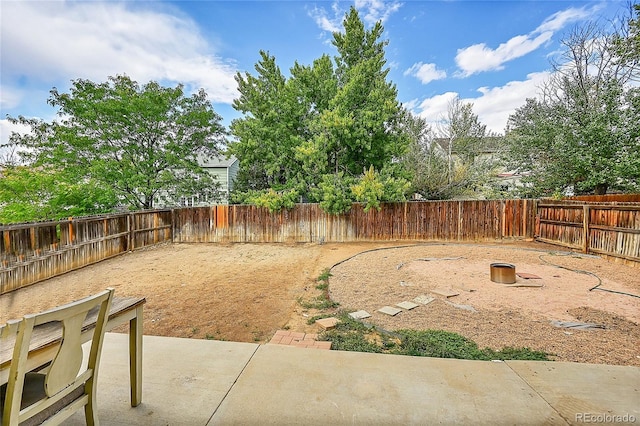 19873 E Vassar Ave, Aurora, CO 80013 - fenced backyard featuring a patio