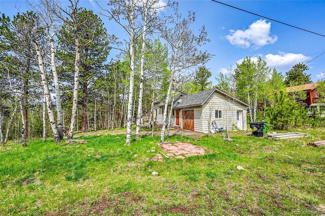 101 Campbell Rd, Bailey, CO 80421 - view of property exterior featuring a lawn