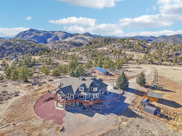 drone / aerial view featuring a mountain view