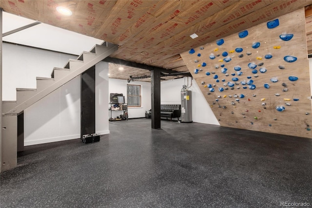 236 Harris Dr, Idaho Springs, CO 80452 - finished basement featuring water heater, stairs, and baseboards
