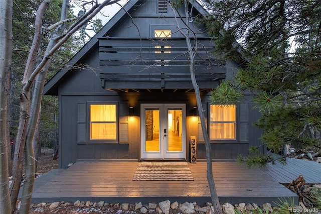 236 Harris Dr, Idaho Springs, CO 80452 - back of property featuring a deck and french doors
