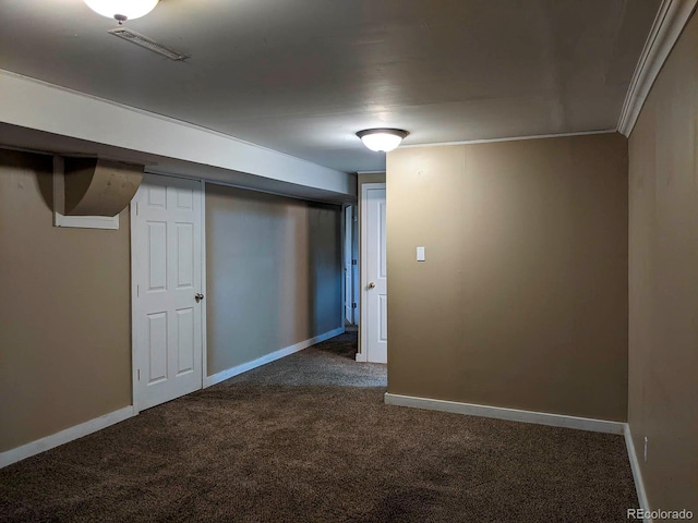 finished below grade area featuring carpet and baseboards